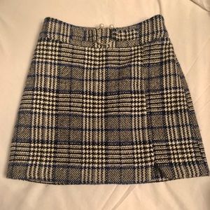 Short, plaid classic skirt.